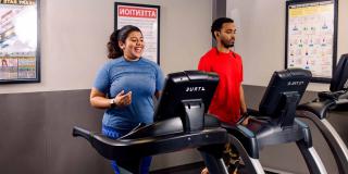 Photo of Katie Tahay running on a treadmill.